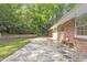 Spacious flagstone patio off the back of a charming brick home at 2406 Oxford Rd, Raleigh, NC 27608