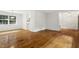 Dining room featuring hardwood floors, ample space for entertaining, and access to the kitchen area at 2406 Oxford Rd, Raleigh, NC 27608