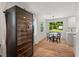 Bright dining room with hardwood floors, a wine fridge and natural light at 2410 Huron St, Durham, NC 27707