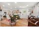 Bright living room featuring hardwood floors, open floor plan and stylish furniture at 2410 Huron St, Durham, NC 27707