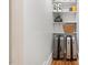Practical storage area with shelving, luggage, and cleaning supplies at 2410 Huron St, Durham, NC 27707