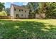 Large backyard featuring patio, pergola, and trampoline at 2555 Winding Creek Ln, Franklinton, NC 27525