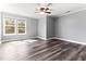 Spacious bedroom with stylish floors, neutral paint, and lots of light at 2555 Winding Creek Ln, Franklinton, NC 27525