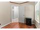 Spacious bedroom with hardwood floors, natural light, and paneled doors at 2555 Winding Creek Ln, Franklinton, NC 27525