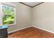 Cozy bedroom with hardwood floors, natural light, and neutral color palette at 2555 Winding Creek Ln, Franklinton, NC 27525