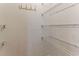 Walk-in closet with coated wire shelving for optimal storage at 2555 Winding Creek Ln, Franklinton, NC 27525