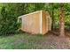 Exterior view of the backyard storage shed at 2555 Winding Creek Ln, Franklinton, NC 27525