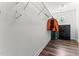 Spacious walk-in closet with wood-look floors, wire shelving, and storage at 2555 Winding Creek Ln, Franklinton, NC 27525