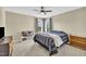 Cozy bedroom featuring neutral walls, carpet, and windows allowing natural light at 2605 Bloomsberry Ridge Dr, Fuquay Varina, NC 27526