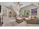 Spacious bonus room with plush carpeting, comfortable seating, and a ceiling fan at 2605 Bloomsberry Ridge Dr, Fuquay Varina, NC 27526