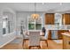 Charming kitchen nook featuring a round table, cushioned chairs, and natural light at 2605 Bloomsberry Ridge Dr, Fuquay Varina, NC 27526