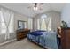Bedroom featuring a vaulted ceiling, carpeted floors, and lots of natural light at 2813 Greenridge View Ln, Zebulon, NC 27597