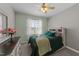 Comfortable bedroom with carpet, window and soft, natural light at 2813 Greenridge View Ln, Zebulon, NC 27597