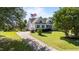 Charming home featuring a well-manicured lawn, driveway, and an American flag proudly displayed at 2813 Greenridge View Ln, Zebulon, NC 27597