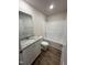 Clean, bright bathroom featuring granite vanity and a tub-shower combination at 299 Starry Sky Dr, Benson, NC 27504