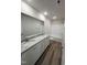 Bright bathroom featuring double sinks, granite countertops, and modern fixtures at 299 Starry Sky Dr, Benson, NC 27504