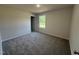 Comfortable bedroom with soft carpet and a bright window for natural light at 299 Starry Sky Dr, Benson, NC 27504