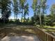 Wooden deck overlooking a yard at 299 Starry Sky Dr, Benson, NC 27504