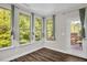 Sun-filled room featuring multiple windows providing an abundance of natural light at 304 Garden Walk Dr, Durham, NC 27703