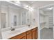 Bathroom with double sink vanity, and walk-in closet at 305 Avent Meadows Ln, Holly Springs, NC 27540