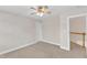 Neutral bedroom with carpet, ceiling fan and natural light at 305 Avent Meadows Ln, Holly Springs, NC 27540