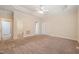 Large bedroom features neutral carpet, ceiling fan and an en-suite bathroom at 322 Bellemont Rd, Pittsboro, NC 27312