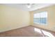 Bright bedroom with carpeted floors, neutral walls, and natural light from the large windows at 406 Dairy Farm Dr, Hillsborough, NC 27278