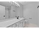 Bathroom with single vanity, large mirror, white cabinets, and a toilet at 4536 Sugarbend Way, Raleigh, NC 27606
