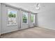 Bedroom featuring natural light, neutral walls, neutral carpet, and a ceiling fan at 4536 Sugarbend Way, Raleigh, NC 27606