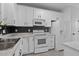This bright kitchen features stainless steel appliances and ample countertop space at 4536 Sugarbend Way, Raleigh, NC 27606