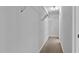 Walk-in closet with white wire shelving and neutral carpet at 4536 Sugarbend Way, Raleigh, NC 27606