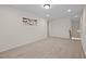 Spacious bedroom featuring neutral carpet, recessed lighting, and ample space at 469 Methven Grove Dr, Cary, NC 27519