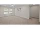 Inviting bedroom with plush carpet, ample natural light, and neutral decor at 469 Methven Grove Dr, Cary, NC 27519