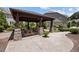 Outdoor pavilion with stone pillars and picnic tables at 469 Methven Grove Dr, Cary, NC 27519