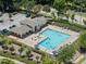 Aerial shot of the community pool with ample seating and a covered pavilion at 469 Methven Grove Dr, Cary, NC 27519