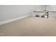 Spacious bonus room featuring neutral carpeting and natural light at 4725 Saratoga Falls Ln, Raleigh, NC 27614