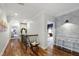 Bright hallway with hardwood floors and stylish decor at 4725 Saratoga Falls Ln, Raleigh, NC 27614