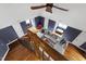 Upper-level view of the living room with a ceiling fan at 4725 Saratoga Falls Ln, Raleigh, NC 27614