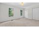 Bright bedroom with natural light from two windows and ample closet space at 4816 Marlborough Way, Durham, NC 27713