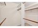 Spacious walk-in closet providing ample storage with multiple rods and shelving units at 4816 Marlborough Way, Durham, NC 27713