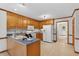 Functional kitchen with ample cabinet space and neutral countertop at 4816 Marlborough Way, Durham, NC 27713