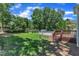 A lush backyard featuring an above-ground pool and a spacious wooden deck at 52 Malcolm Dr, Clayton, NC 27520