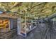 View of the unfinished basement with vapor barrier, insulation, and shelving at 52 Malcolm Dr, Clayton, NC 27520
