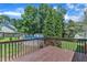 A deck with a view to an above-ground pool and fenced backyard at 52 Malcolm Dr, Clayton, NC 27520