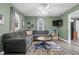 Cozy living room boasts a large sectional sofa, modern TV, and open space at 527 N Cypress St, Wendell, NC 27591