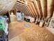 Spacious unfinished attic with plywood flooring and exposed roof beams providing ample storage at 55 Ridge Haven Dr, Louisburg, NC 27549