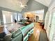 Open-concept living area features hardwood floors, ample seating, and easy access to the kitchen at 55 Ridge Haven Dr, Louisburg, NC 27549
