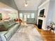 Spacious living room features hardwood floors, a fireplace, and an open layout perfect for entertaining at 55 Ridge Haven Dr, Louisburg, NC 27549