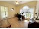Office with hardwood flooring, large windows, and a traditional style desk set at 55 Ridge Haven Dr, Louisburg, NC 27549