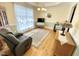 Cozy sitting room with a neutral color scheme, hardwood floors, and plenty of natural light at 55 Ridge Haven Dr, Louisburg, NC 27549